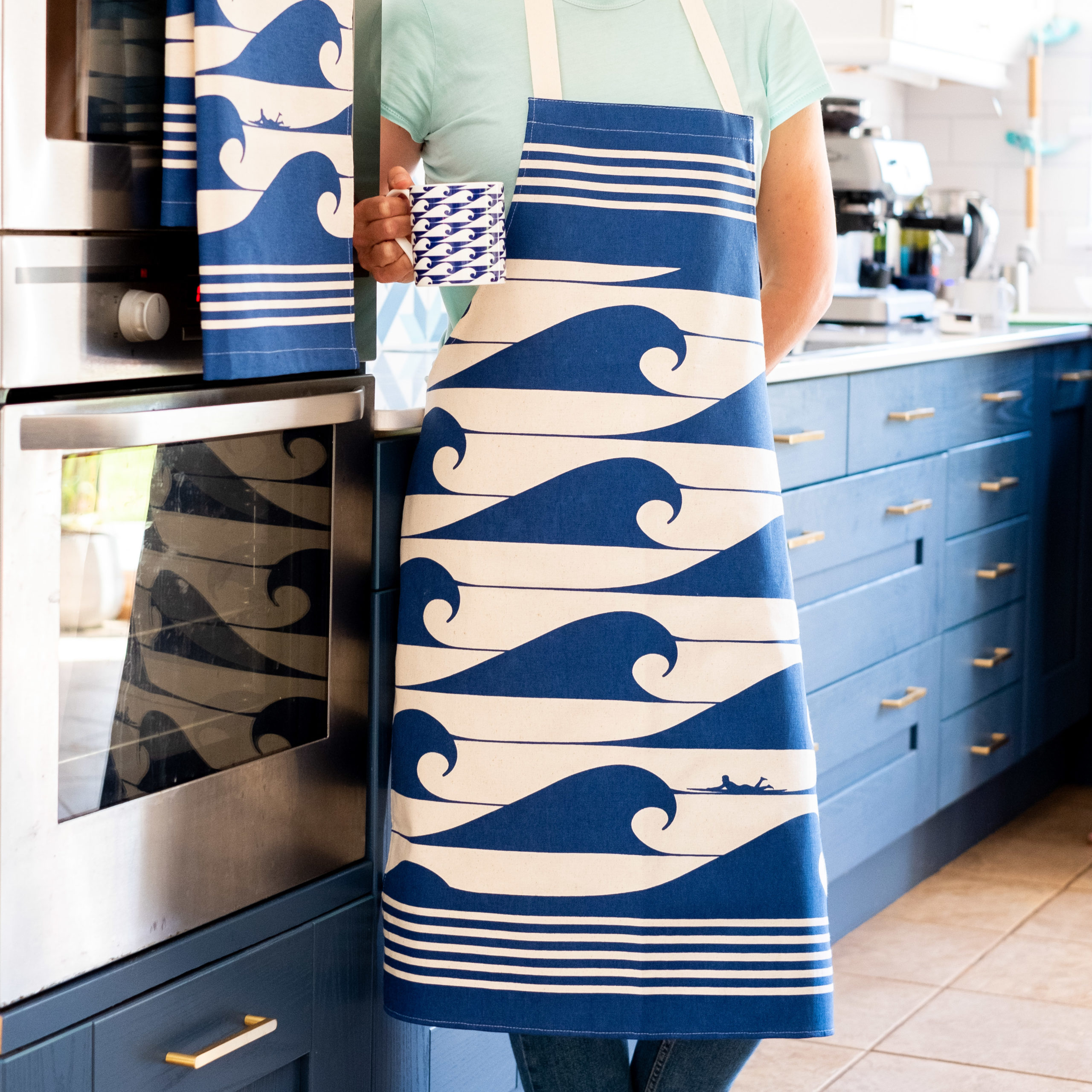 Luxury Organic Cotton Apron paired with blue and black tea towels