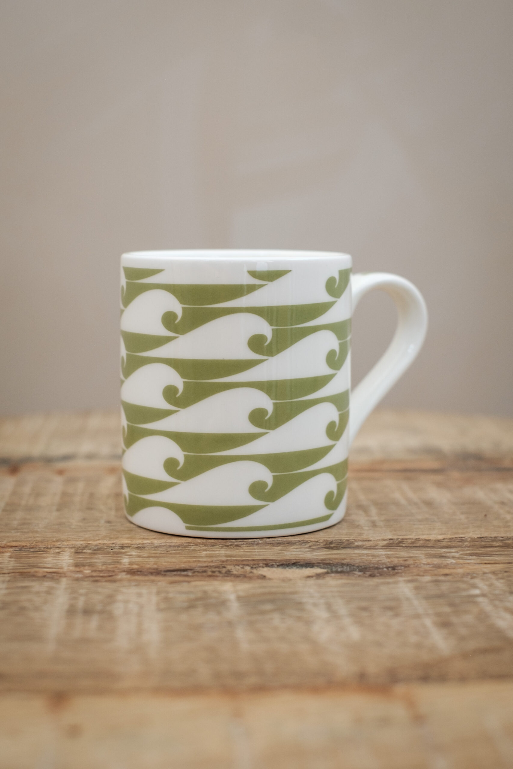 The Cornish Surfer espresso cup “The Shorty” with seagrass wave design, made in Cornwall.