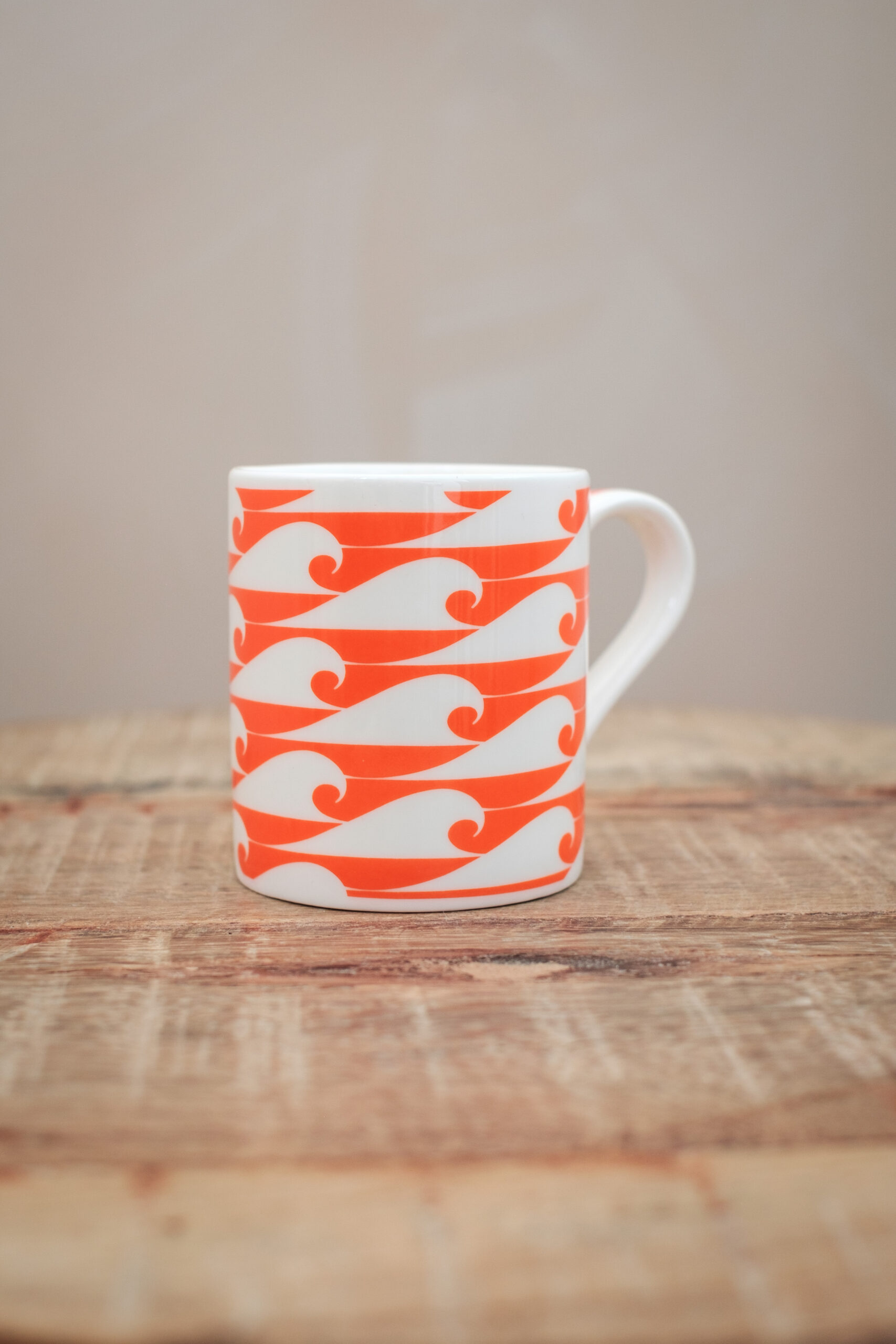 The Cornish Surfer espresso cup “The Shorty” with Coral wave design, made in Cornwall.